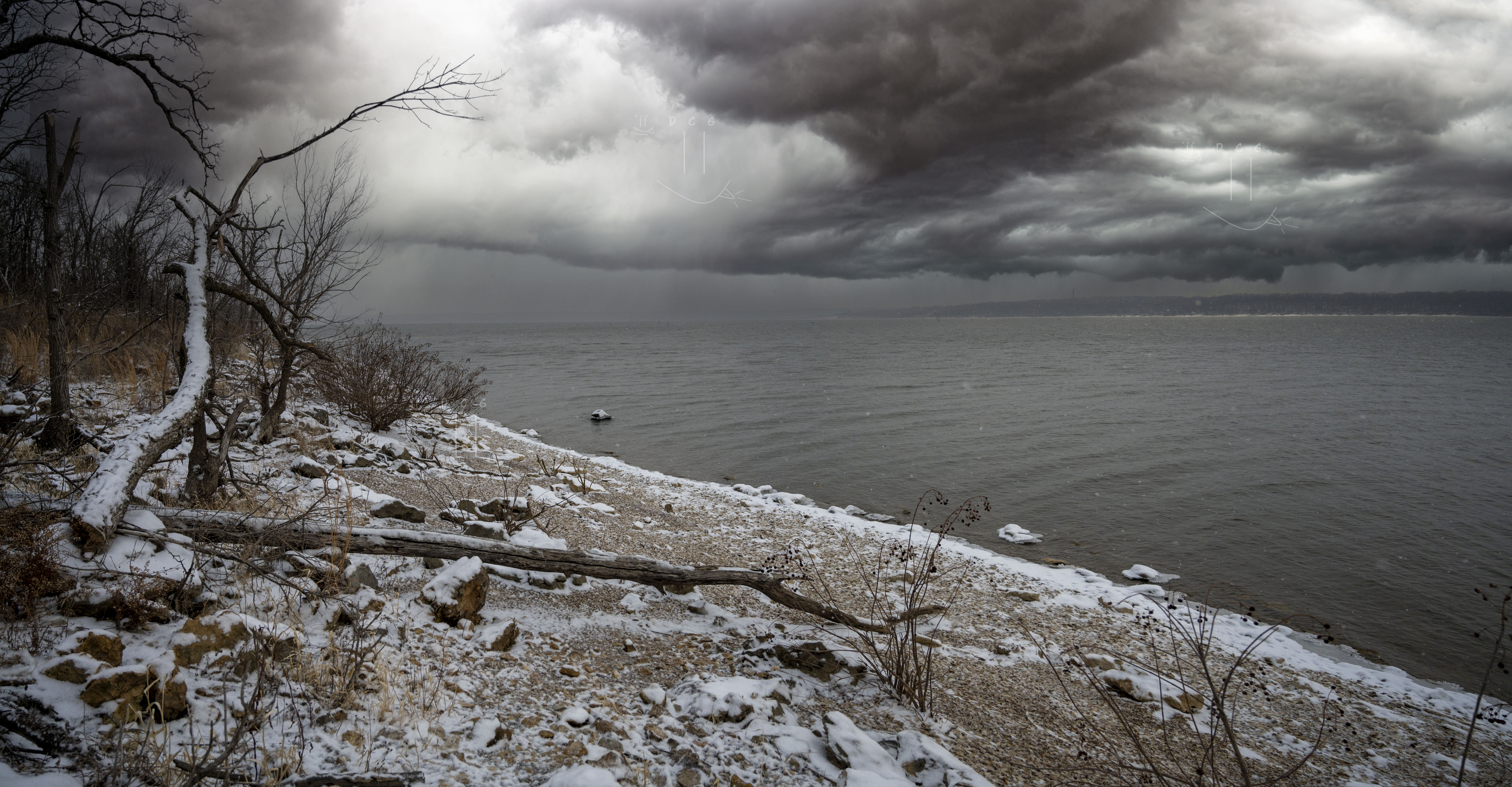 Frozen lake cloudy skies